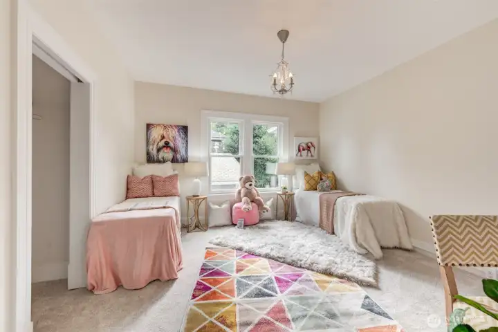 Second upstairs bedroom is generously sized.