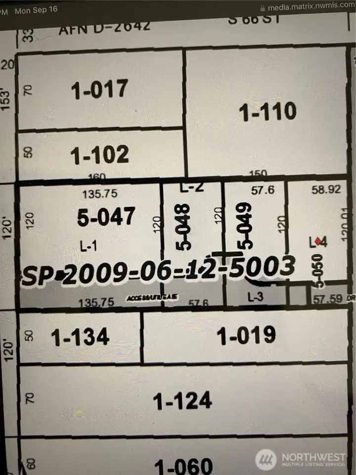 Darker gray is easement to access the three subject lots.  Easement is off Wapato at Real Estate Sign post.