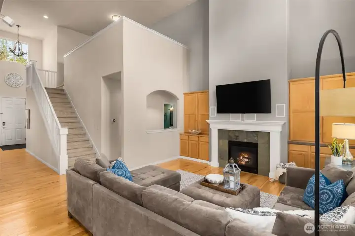 An open concept great room is made even more grand with vaulted ceilings.