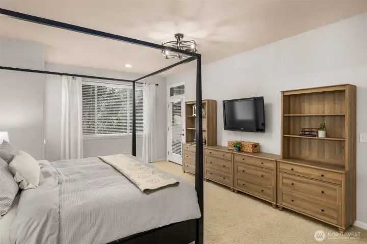 This door leads to the backyard from the primary suite.