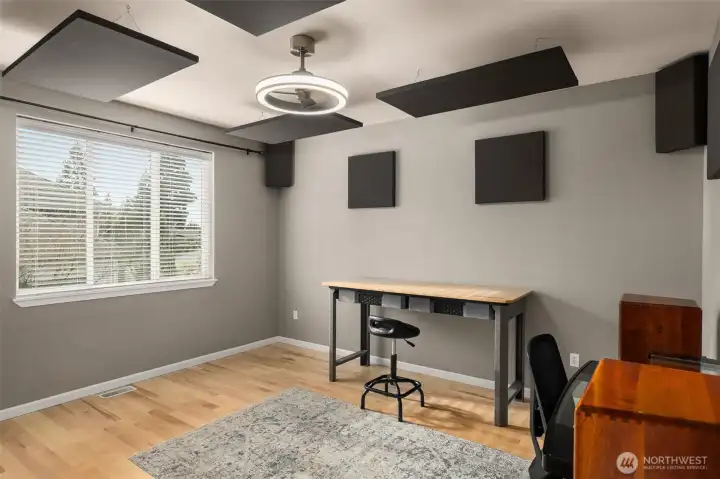 This is a large bonus room with acoustic sound panels. The buyer can decide if the panels should stay or be removed.