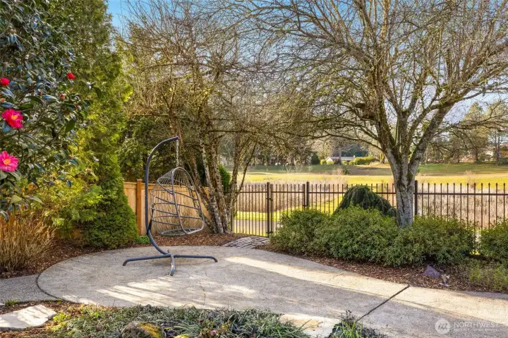 The yard is fully fenced, and this gate opens to the mountain view walking path. The disc golf course is just beyond the path.