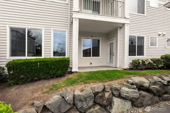 You can get to this patio from the living room and the from the primary bedroom.