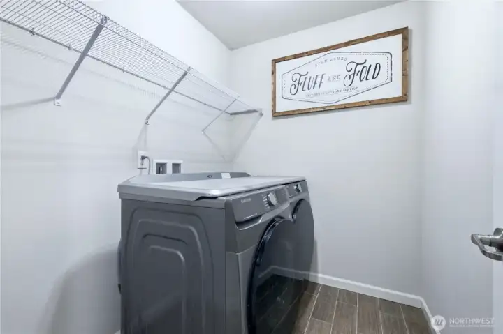 Spacious laundry room upstairs.