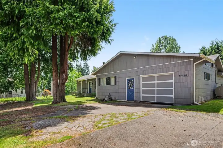 The thoughtful layout offers one bedroom situated separately on one side of the home, ideal for a private office, guest room, or creative space.