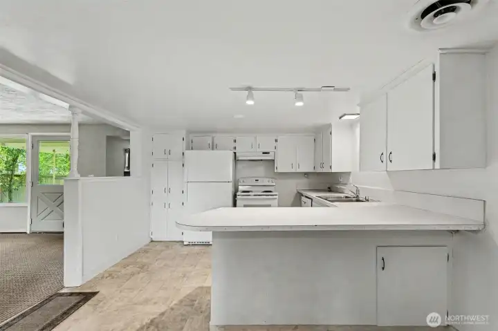The spacious kitchen is ready for your personal updates and ideas.