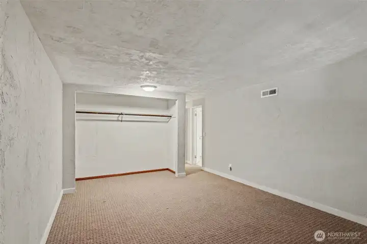 Primary bedroom with large closet.