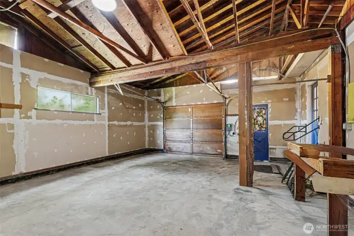 Additional highlights include a single-car garage equipped with an EV charger and plenty of extra room for storage or workspace.