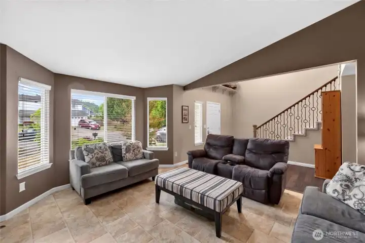 Living space with cozy fireplace.