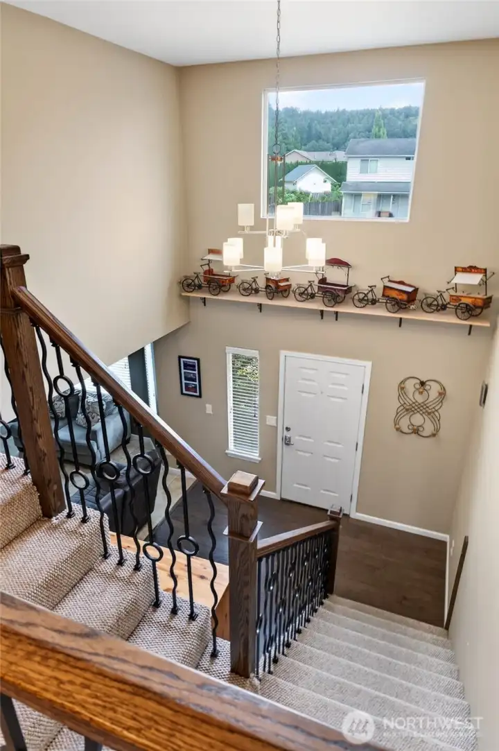 Bright entry with tall ceilings.