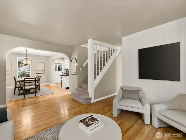 Abundant natural light, and an effortless flow to the dining room and kitchen create an inviting space that's equally suited for quiet evenings or gathering with friends and loved ones.