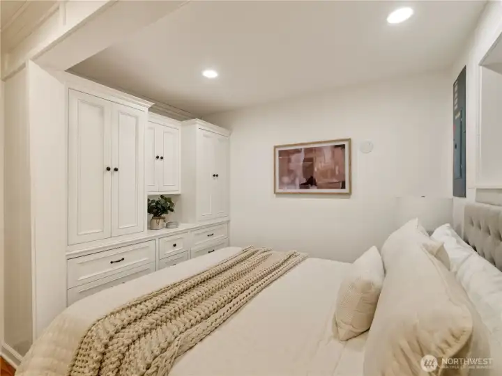 Custom built-in cabinetry provides exceptional storage while maintaining a clean, tailored look.