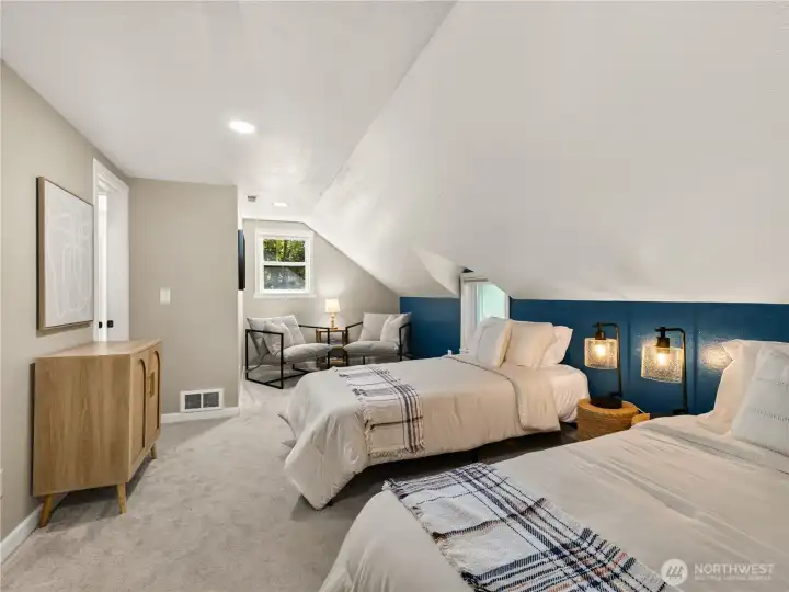 The generous layout easily accommodates multiple sleeping arrangements, making it ideal for guests or shared living.