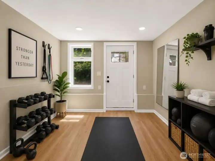 Fitness Studio Option. This image has been virtually staged to demonstrate one possible design for a home gym.