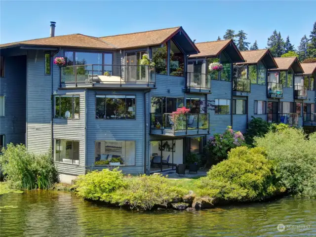 Welcome Home! This Garden Level Corner Condo Sits on the Banks of Echo Lake!