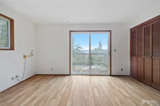 Main floor primary bedroom w slider onto private deck with gorgeous views of Saratoga Passage.