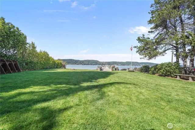 Large lawn for summertime picnics, lawn games and more