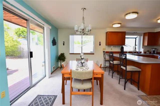 Large doors allowing ease of access to the huge custom deck; great for bbq'ing and entertaining.