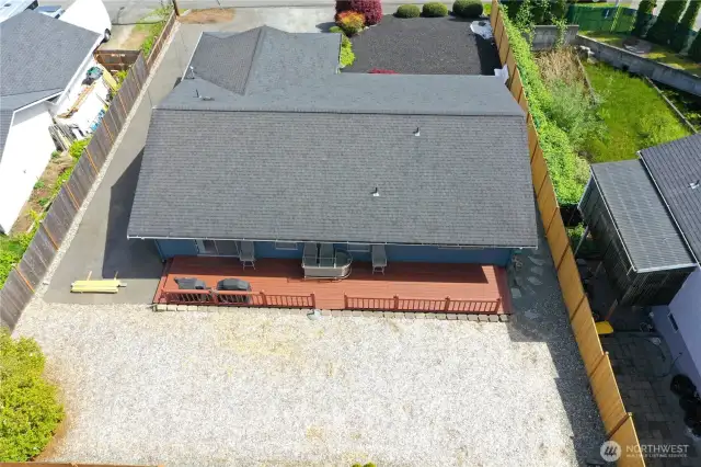 Huge backyard w/large custom deck.
