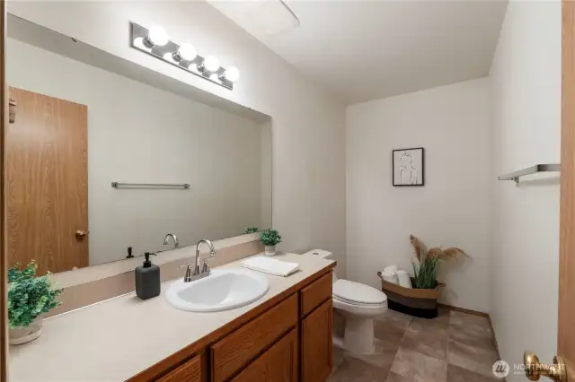 Half bath downstairs. Room for a tub and shower combo.
