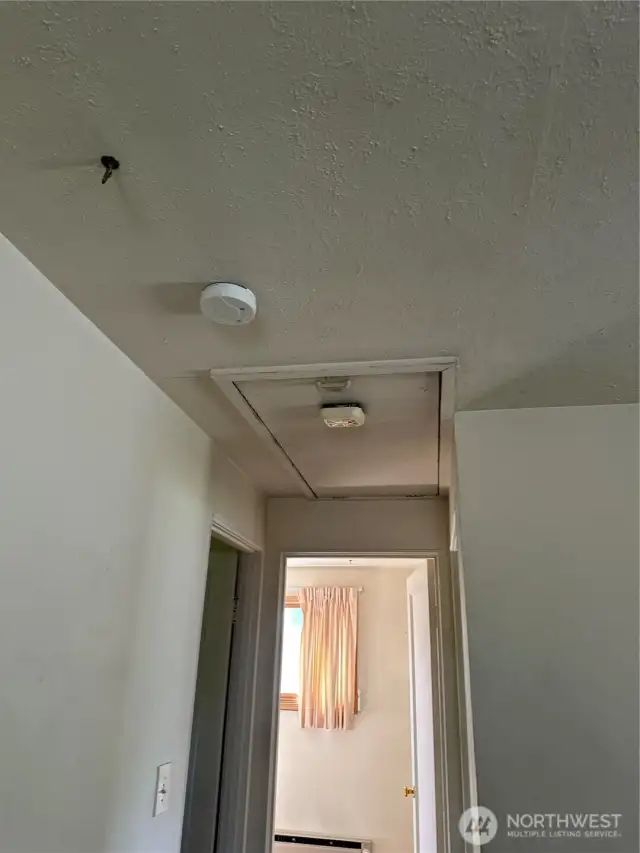 Drop down attic stairs