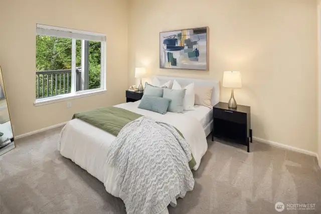 Lower level guest bedroom with large closet and private Greenbelt views.