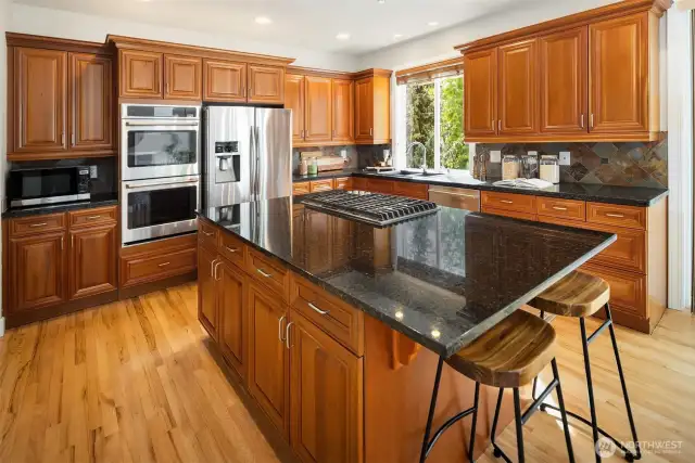 Large chef's kitchen features SS appliances.  Tons of storage and a   butler's pantry