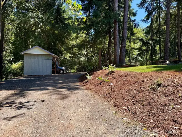 Nice entryway into the property with a carport.