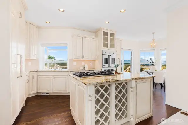 Beautiful painted custom cabinets with soft close drawers to take advantage of all of the nooks and crannies for optimal storage.