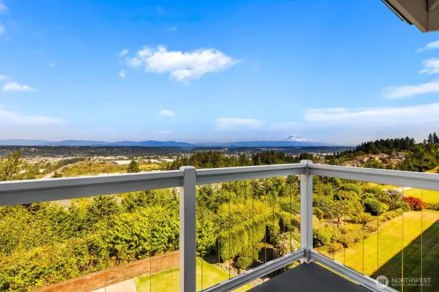 Views from the deck off the primary suite. Glass slat railing