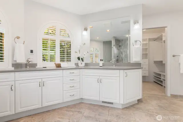 Lots of storage, and plantation shutters in the primary bath. Dressing room with shelves and built in drawers.