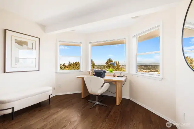 Office on the second floor with oak hardwood floors and views.