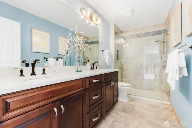 Main bath upstairs with double vanity, beautiful tile. Soft close drawers and pull out drawers under the sink are a nice touch.