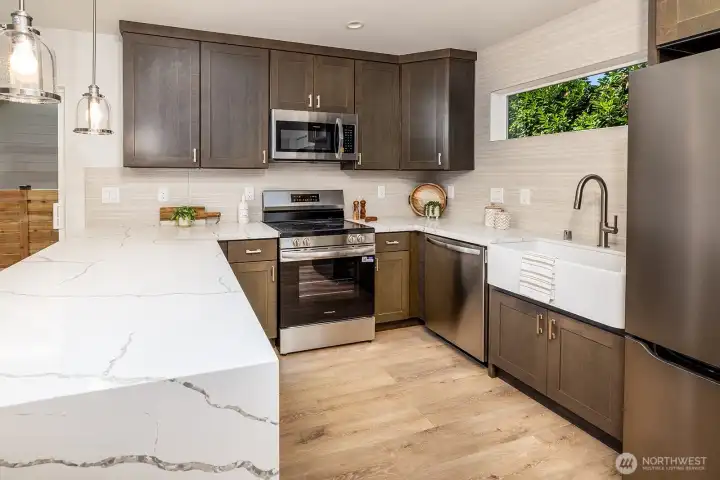 Your kitchen has been carefully designed to capture the natural elements that balance the interior and exterior of the home.