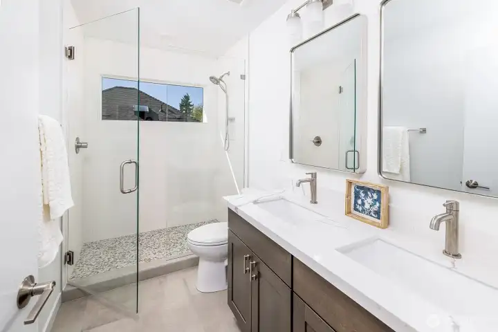 Primary bathroom with heated floors, dual vanities and expansive walk in shower!