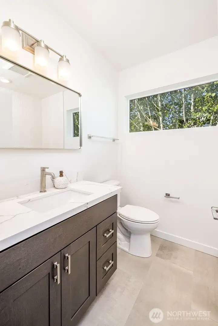 Second bathroom with heated floors and beautiful shower/bath combintation.