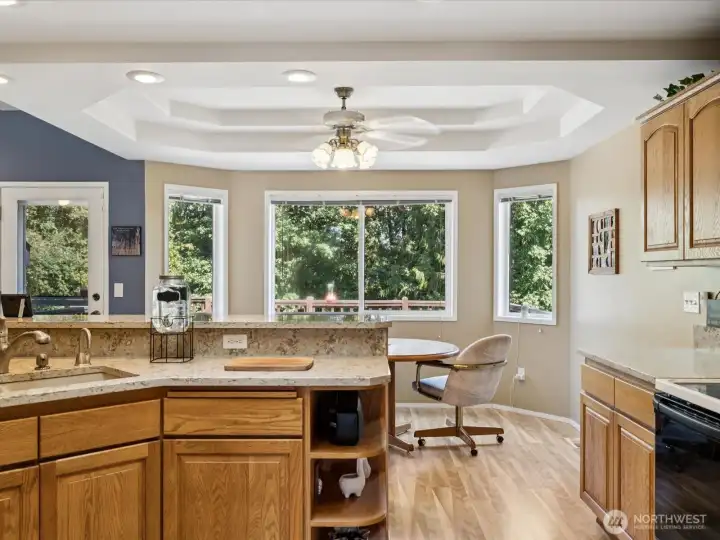 Main level kitchen with breakfast bar.  Recessed ceilings.