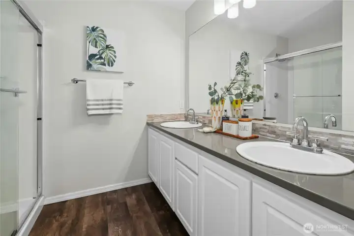 Primary Bath with double vanity and walk-in shower.