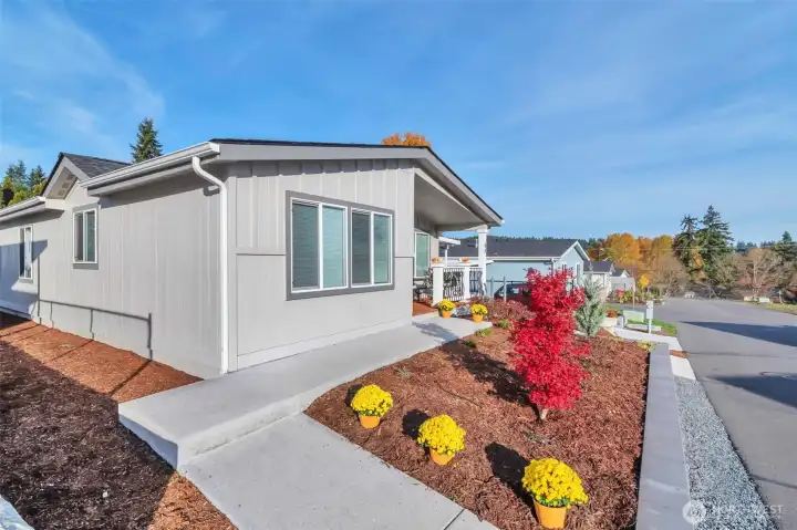 Vibrant and low maintenance landscaping with year 'round color and plantings.  Neatly defined areas and on street parking, plus visitor parking.