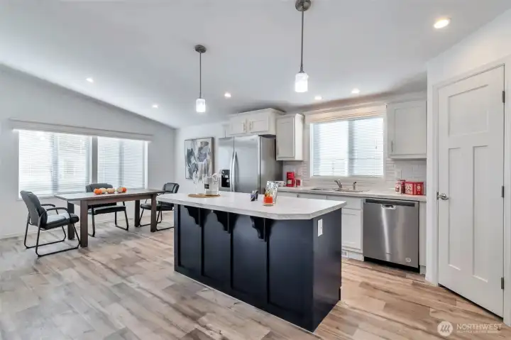 Dining area roomy enough for large table and hosting holiday gatherings, or small groups and extra help for the Chefs in the kitchen.