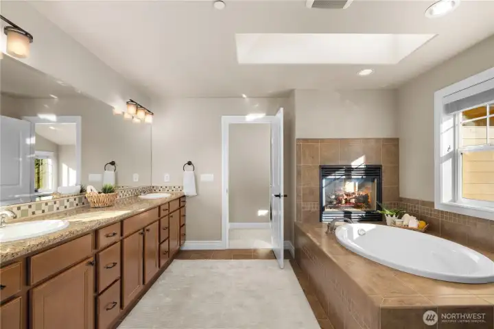 Primary bath is a full 5 piece with separate tub and shower.