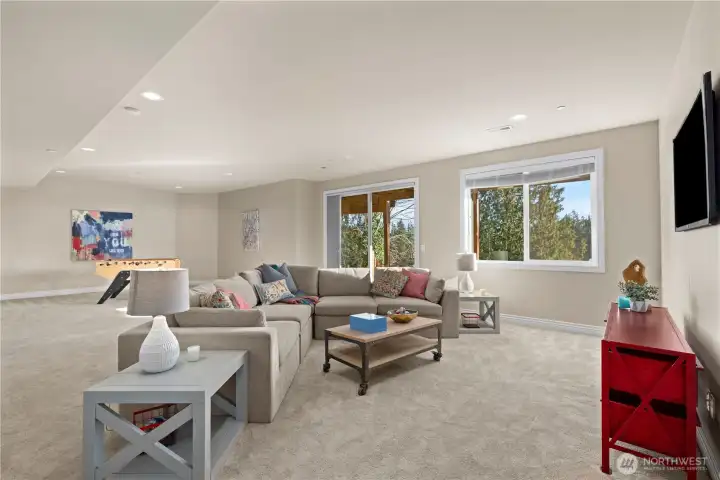 Massive great room downstairs makes for a great media room or good separation for extended family or guests.