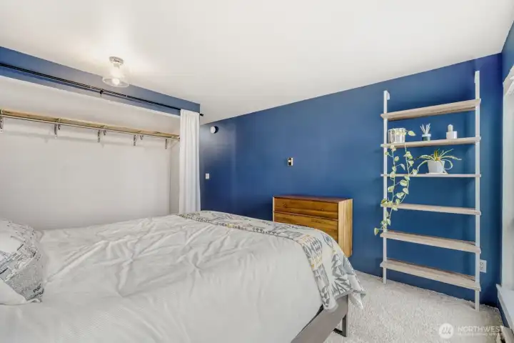 Primary bedroom bathed in natural light.