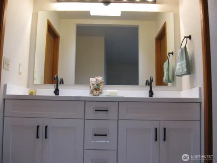 Primary double sink vanity.