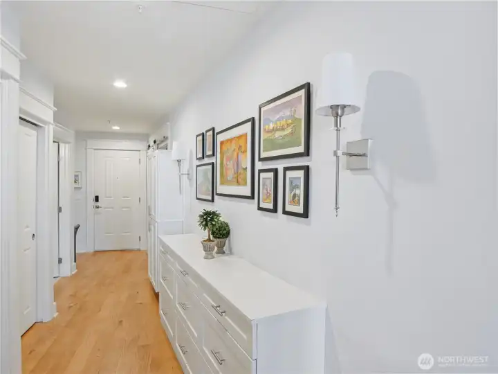 Staged view of the built in's that line the hallway.  Staged photo prior to seller moving.