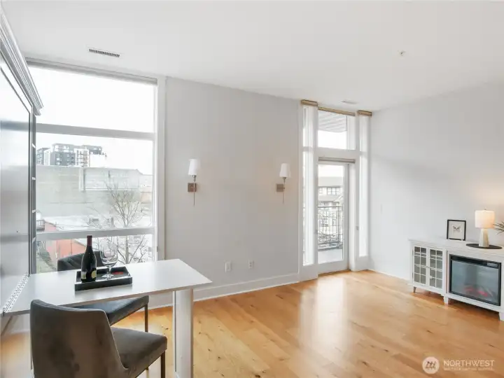 Living room and Built in Murphy bed converted to Desk.  Multiple function pull down table.