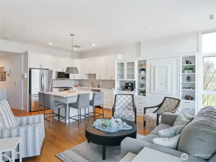 Staged: Looking back at the Living/Dining Room combination from patio door.