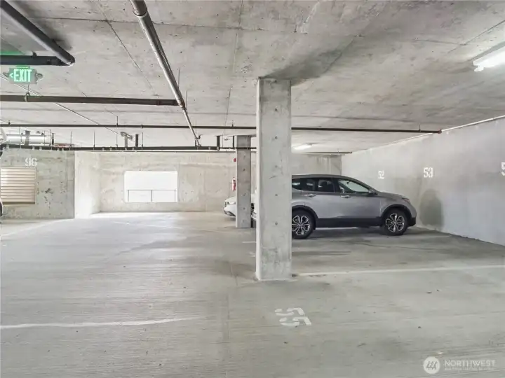 View of the covered secured parking in the garage.  #53.  Access of 7th Street.