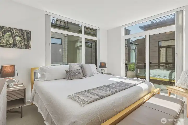 Deck of primary bedroom for a moment of sun and flowers