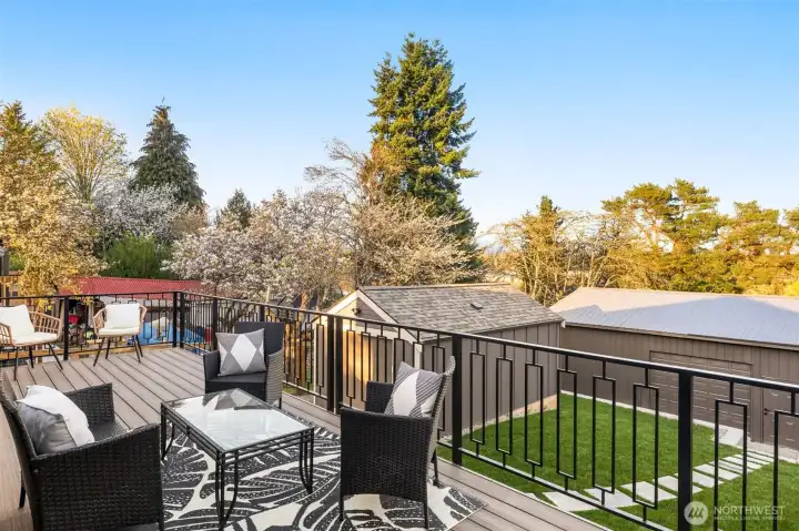 Enjoy eating, entertaining, and relaxing from the enlarged back deck that overlooks the large lot & greenbelt